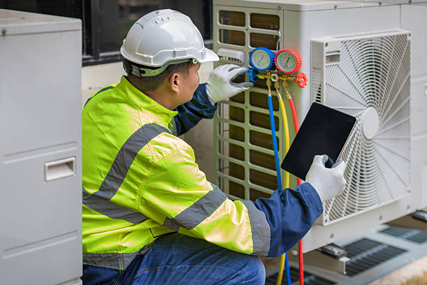 Professional Heat Pump Repair technician working in Swannanoa, NC